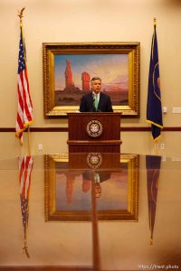 Utah Governor Jon Huntsman Jr signs a tax bill into law at a press conference. 9.20.2006