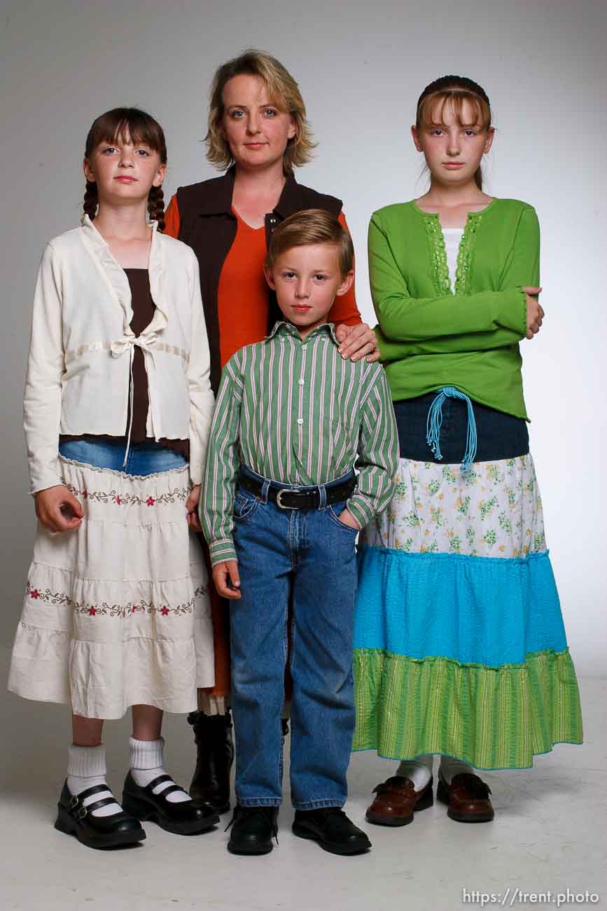 Salt Lake City - Candice White, a resident of Centennial Park, Arizona, with her children  Charlie Ann White (left, 11), Gary Ryan White (center, 7), and Kelly Elaine White (right, 13). ; 9.30.2006