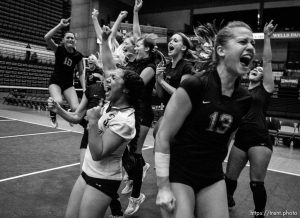 Orem - Cottonwood celebrates their championship. Diana Franca (13 at right) and Trustine Mendoza (left in light jersey). Cottonwood defeats Murray for the 4A state championship, girls high school volleyball at UVSC.