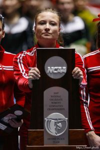 utah's nicolle ford with second place trophy. NCAA Women's Gymnastics Championships at the Huntsman Center