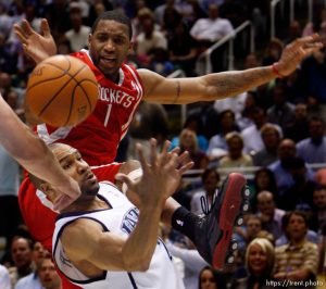 Salt Lake City - Utah Jazz guard Derek Fisher (2) knocks the ball away from Tracy McGrady (top). Utah Jazz vs. Houston Rockets, game 6, NBA playoffs first round.  Jazz win 94-82