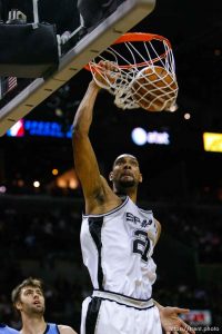 San Antonio - San Antonio Spurs forward Tim Duncan  (21) dunks the ball, Utah Jazz center Mehmet Okur (13), of Turkey, defending. Utah Jazz vs. San Antonio Spurs, NBA basketball, Western Conference Finals Game One.
5.20.2007