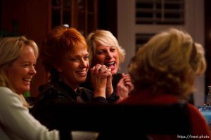 Salt Lake City - Members of the Blue Thong Society's Park City chapter trade jokes over dinner. Left to right: Nancy Ramaley, Nancy Haga, Debra Harris, Deanna Colaizzi (back to camera) and Cheryl Leonard. The Blue Thong Society is the Baby Boomers' alternative to the Red Hat Society. Their mission is to 