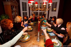 Salt Lake City - Members of the Blue Thong Society's Park City chapter raise their Blue Thongaritas for a toast to kick off dinner. Left to right: Nancy Haga, Debra Harris, MaryAnn Mackley, Cheryl Leonard, Miki Laus, Cynthia Sulprizio, Barbara Maben, and Sandra Ramsey. The Blue Thong Society is the Baby Boomers' alternative to the Red Hat Society. Their mission is to 