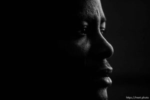 Salt Lake City - Etienne Barabiraho is a refugee from Burundi, and a single parent who now lives in Salt Lake City with his four children. With his 3 1/2 year old son Iranzi Beatrice at right, Barabiraho told his story Tuesday, December 18, 2007.