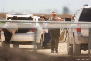 Eldorado - Young FLDS woman with baby arriving at civic center during raid on the FLDS YFZ 
