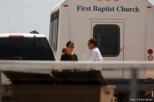 Eldorado - CPS worker, first baptist church bus at civic center during raid on the FLDS YFZ 