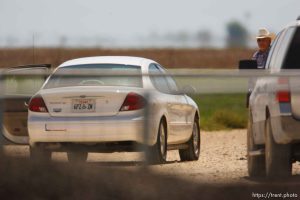 Eldorado - Young FLDS woman leaving civic center in small car during raid on the FLDS YFZ 