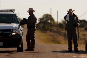 Eldorado - Texas State Troopers Sgt. Stan Waters (fur collar) and Martin Molotsky manning a roadblock on road CR-300, which leads to the FLDS YFZ 