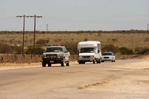Eldorado - First Baptist Church bus coming out on CR-300 during raid on the FLDS YFZ 