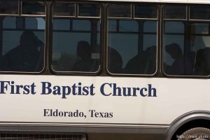 Eldorado - First Baptist Church bus coming out on CR-300 during raid on the FLDS YFZ 