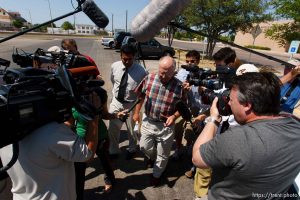 San Angelo - Attorney Jimmy Stewart is chased to his car by reporters as left a gathering of attorneys at the DFPS at the Ralph R. Chase building Sunday, June 1, 2008 to hammer out an agreement to return over 450 children that were taken from the YFZ ranch.