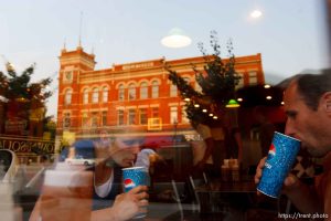 Provo - With sunset hitting the historic Knight Building reflected in the window, Chelsea and Jeff Marvell had dinner at The Smokehouse in downtown Provo Friday, July 11, 2008.