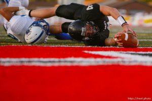 Sandy - Alta vs. Bingham high school football Friday, August 29, 2008. Alta QB Ammon Olsen stretches for the endzone, but come up short. Bingham's Keith Sasine, left, and LT. Filiaga