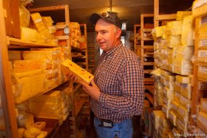Hildale -, Tuesday August 11, 2009. finney farms. winford barlow in cheese cold storage