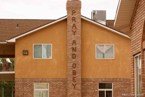 Hildale -, Wednesday August 12, 2009.
pray and obey on brick chimney at jeffs home