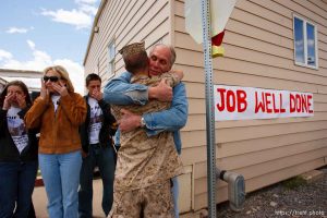 Trent Nelson  |  The Salt Lake Tribune
Bluffdale - The Marines of Charlie Company, 4th LAR, returned home from Afghanistan Saturday, May 29, 2010, without two of their brothers in arms. Although it was painful, the family of fallen Marine Nigel Olsen was at Camp Williams to meet them. As Nigel's father Todd Olsen embraced lance corporal Bryce Lewis, family members Sarah Anthony (sister), Kim Olsen (mother) and Quinn Olsen (brother) wiped away tears.