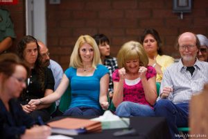 Trent Nelson  |  The Salt Lake Tribune
Draper - Family members of Nicolas G. Kirk, a deputy shot by Ronnie Lee Gardner, react as the Utah Board of Pardons and Parole announced their unanimous decision to deny Ronnie Lee Gardner's request for commutation Monday, June 14, 2010. He is scheduled to be executed by firing squad Friday. Left to right, front row, Jamie Stewart (granddaughter), Mandi Hull (granddaughter), Barb Webb (daughter). Left to right, back row, Doug Fawson (director of victim services, department of corrections), Tammie Atkin (victim advocate, Utah Attorney General's Office), Tami Stewart (daughter).