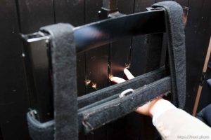 Trent Nelson  |  The Salt Lake Tribune Draper - The execution chamber at the Utah State Prison after Ronnie Lee Gardner was executed by firing squad Friday, June 18, 2010. Four bullet holes are visible in the wood panel behind the chair. Gardner was convicted of aggravated murder, a capital felony, in 1985.