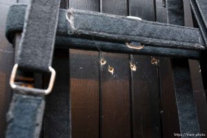 Trent Nelson  |  The Salt Lake Tribune Draper - The execution chamber at the Utah State Prison after Ronnie Lee Gardner was executed by firing squad Friday, June 18, 2010. Four bullet holes are visible in the wood panel behind the chair. Gardner was convicted of aggravated murder, a capital felony, in 1985.