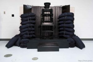 Trent Nelson  |  The Salt Lake Tribune
Draper - The execution chamber at the Utah State Prison after Ronnie Lee Gardner was executed by firing squad Friday, June 18, 2010. Four bullet holes are visible in the wood panel behind the chair. Gardner was convicted of aggravated murder, a capital felony, in 1985.