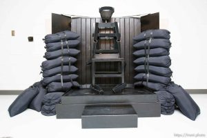 Trent Nelson  |  The Salt Lake Tribune Draper - The execution chamber at the Utah State Prison after Ronnie Lee Gardner was executed by firing squad Friday, June 18, 2010. Four bullet holes are visible in the wood panel behind the chair. Gardner was convicted of aggravated murder, a capital felony, in 1985.