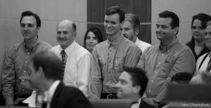 Trent Nelson  |  The Salt Lake Tribune
In the gallery, people stand to show honor and respect to Warren Jeffs, leader of the FLDS Church, appeared before Judge Terry Christiansen in Third District Court  Tuesday, September 7, 2010 in West Jordan, Utah. guy nielsen, wendell nielsen, mosiah jeffs, john wayman, merril jessop. back row gary batchelor and heidi mattingly foster