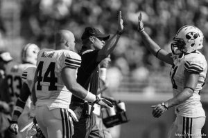 Trent Nelson  |  The Salt Lake Tribune BYU coach Bronco Mendenhall high-fives BYU linebacker Shane Hunter (51)  in the second quarter, BYU vs. Florida State, college football Saturday, September 18, 2010 at Doak Campbell Stadium in Tallahassee, Florida.