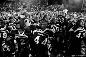 Trent Nelson  |  The Salt Lake Tribune Utah State's Devin Johnson (44) and the rest of the team celebrate their victory over BYU with the Utah State fight song. Utah State vs. BYU college football in Logan Friday, October 1, 2010.