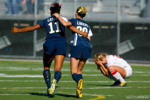 Trent Nelson  |  The Salt Lake Tribune Bonneville's Allie Shaw (left) and Valerie Buckway celebrate as Bonneville defeats East high school 1-0, 4A girls' soccer state championships semifinals at Juan Diego High School Tuesday, October 19, 2010. At right is East's Audrey Gibb.