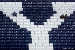 Trent Nelson  |  The Salt Lake Tribune BYU football fans sit in the rain awaiting the start of the BYU vs. Wyoming college football game Saturday, October 23, 2010 at LaVell Edwards Stadium in Provo.