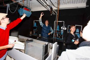 Michael Friberg, Erik Daenitz, Djamila Grossman in the darkroom looking for a light switch. Self-Assigned photo exhibition at Kimball Arts Center, Friday, October 29, 2010.