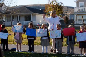 Trent Nelson  |  The Salt Lake Tribune SFC Mike Jones, Utah National Guard, was welcomed home to Eagle Mountain by family, friends and neighbors who lined the streets of Eagle Mountain Friday, November 12, 2010. On his fourth deployment, Jones was injured in Afghanistan in September.