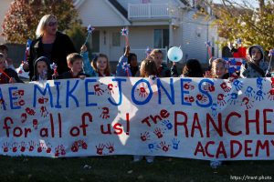 Trent Nelson  |  The Salt Lake Tribune SFC Mike Jones, Utah National Guard, was welcomed home to Eagle Mountain by family, friends and neighbors who lined the streets of Eagle Mountain Friday, November 12, 2010. On his fourth deployment, Jones was injured in Afghanistan in September.