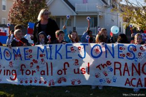 Trent Nelson  |  The Salt Lake Tribune SFC Mike Jones, Utah National Guard, was welcomed home to Eagle Mountain by family, friends and neighbors who lined the streets of Eagle Mountain Friday, November 12, 2010. On his fourth deployment, Jones was injured in Afghanistan in September.