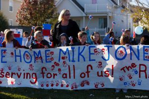 Trent Nelson  |  The Salt Lake Tribune SFC Mike Jones, Utah National Guard, was welcomed home to Eagle Mountain by family, friends and neighbors who lined the streets of Eagle Mountain Friday, November 12, 2010. On his fourth deployment, Jones was injured in Afghanistan in September.
