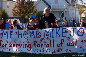 Trent Nelson  |  The Salt Lake Tribune SFC Mike Jones, Utah National Guard, was welcomed home to Eagle Mountain by family, friends and neighbors who lined the streets of Eagle Mountain Friday, November 12, 2010. On his fourth deployment, Jones was injured in Afghanistan in September.