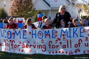 Trent Nelson  |  The Salt Lake Tribune SFC Mike Jones, Utah National Guard, was welcomed home to Eagle Mountain by family, friends and neighbors who lined the streets of Eagle Mountain Friday, November 12, 2010. On his fourth deployment, Jones was injured in Afghanistan in September.