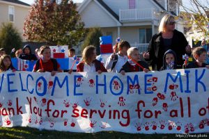 Trent Nelson  |  The Salt Lake Tribune SFC Mike Jones, Utah National Guard, was welcomed home to Eagle Mountain by family, friends and neighbors who lined the streets of Eagle Mountain Friday, November 12, 2010. On his fourth deployment, Jones was injured in Afghanistan in September.