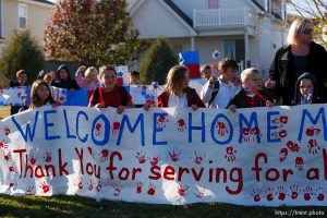Trent Nelson  |  The Salt Lake Tribune SFC Mike Jones, Utah National Guard, was welcomed home to Eagle Mountain by family, friends and neighbors who lined the streets of Eagle Mountain Friday, November 12, 2010. On his fourth deployment, Jones was injured in Afghanistan in September.