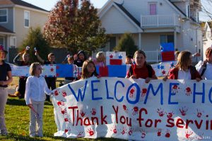 Trent Nelson  |  The Salt Lake Tribune SFC Mike Jones, Utah National Guard, was welcomed home to Eagle Mountain by family, friends and neighbors who lined the streets of Eagle Mountain Friday, November 12, 2010. On his fourth deployment, Jones was injured in Afghanistan in September.