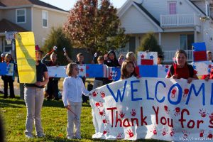 Trent Nelson  |  The Salt Lake Tribune SFC Mike Jones, Utah National Guard, was welcomed home to Eagle Mountain by family, friends and neighbors who lined the streets of Eagle Mountain Friday, November 12, 2010. On his fourth deployment, Jones was injured in Afghanistan in September.