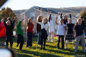 Trent Nelson  |  The Salt Lake Tribune SFC Mike Jones, Utah National Guard, was welcomed home to Eagle Mountain by family, friends and neighbors who lined the streets of Eagle Mountain Friday, November 12, 2010. On his fourth deployment, Jones was injured in Afghanistan in September.