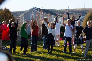 Trent Nelson  |  The Salt Lake Tribune SFC Mike Jones, Utah National Guard, was welcomed home to Eagle Mountain by family, friends and neighbors who lined the streets of Eagle Mountain Friday, November 12, 2010. On his fourth deployment, Jones was injured in Afghanistan in September.