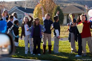 Trent Nelson  |  The Salt Lake Tribune SFC Mike Jones, Utah National Guard, was welcomed home to Eagle Mountain by family, friends and neighbors who lined the streets of Eagle Mountain Friday, November 12, 2010. On his fourth deployment, Jones was injured in Afghanistan in September.