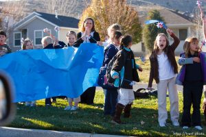 Trent Nelson  |  The Salt Lake Tribune SFC Mike Jones, Utah National Guard, was welcomed home to Eagle Mountain by family, friends and neighbors who lined the streets of Eagle Mountain Friday, November 12, 2010. On his fourth deployment, Jones was injured in Afghanistan in September.