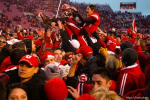 Trent Nelson  |  The Salt Lake Tribune  Fans flood the field after the Utes beat BYU on a blocked field goal attempt at Rice-Eccles Stadium Saturday, November 27, 2010. The final score was Utah 17-BYU 16. Jordan Wynn