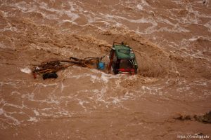Trent Nelson  |  The Salt Lake Tribune A truck in the middle of Beaver Dam Wash in Motoqua, Utah, Wednesday, December 22, 2010.