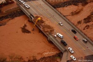 Trent Nelson  |  The Salt Lake TribuneWorkers clear debris (mainly trees) from underneath the bridge at Valley View Drive on the Santa Clara River, Wednesday, December 22, 2010.