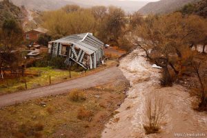 Trent Nelson  |  The Salt Lake Tribune A road washed out by Beaver Dam Wash in Motoqua, Utah, Wednesday, December 22, 2010.